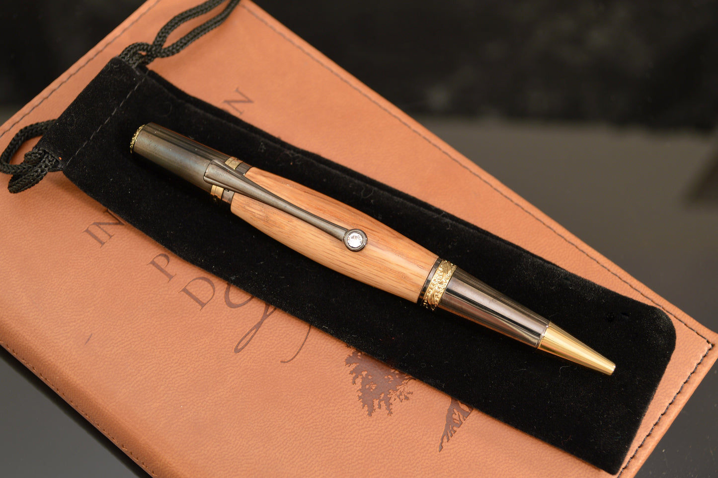 Whiskey Barrel Majestic Squire Twist Pen in Black Titanium and Gold Titanium with Swarovski Crystal.