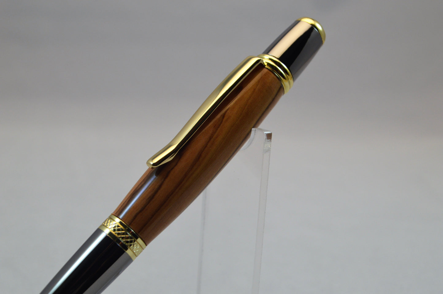 Handcrafted Bethlehem Olivewood Twist Pen in Gold Titanium and Black Titanium Finish