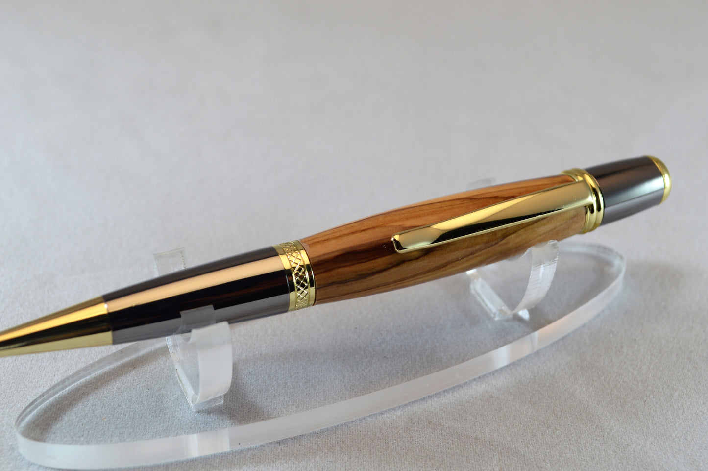 Handcrafted Bethlehem Olivewood Twist Pen in Gold Titanium and Black Titanium Finish