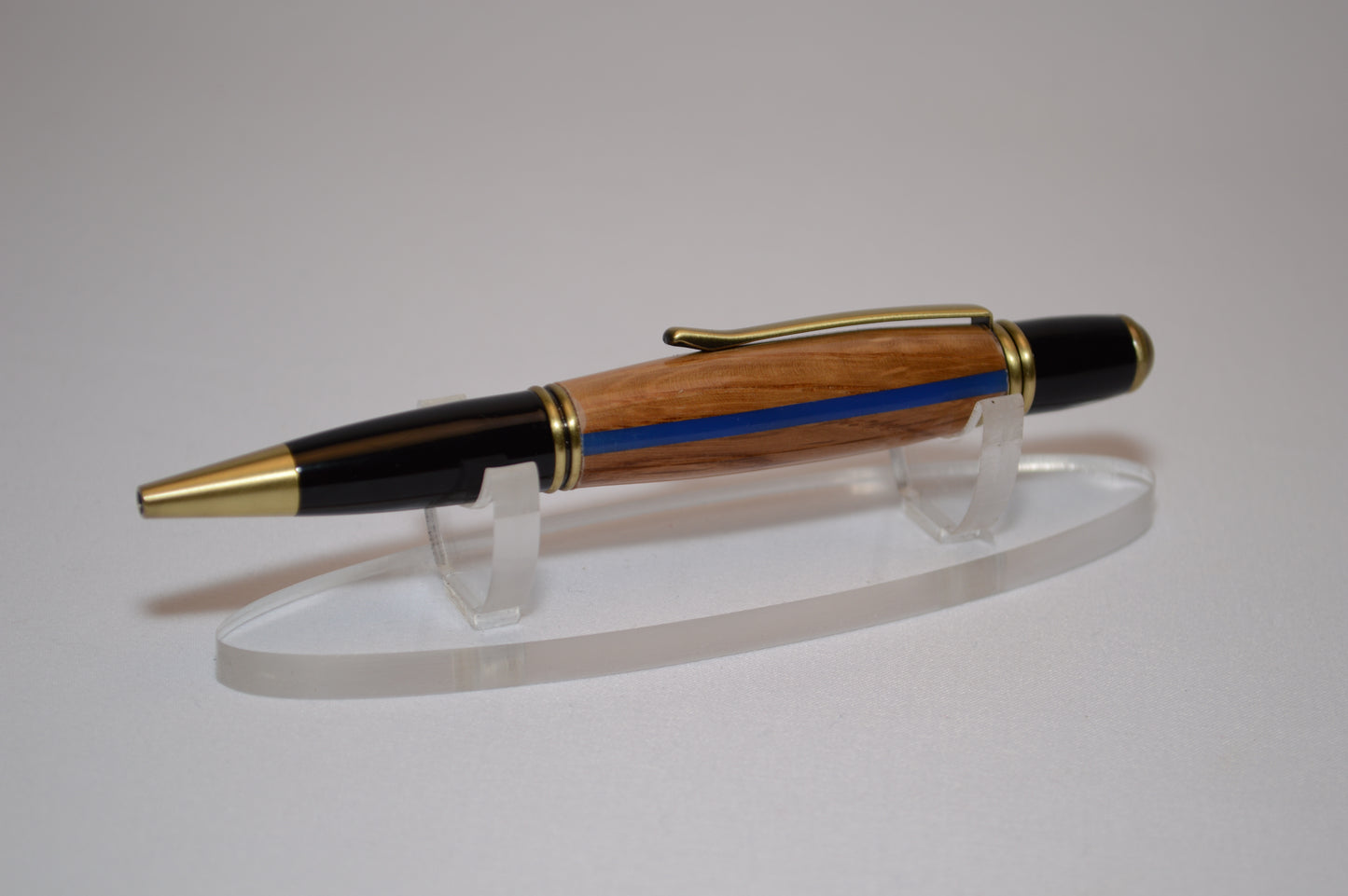Thin Blue Line  Twist Pen  in Oak With a  Antique Brass and Black Finish