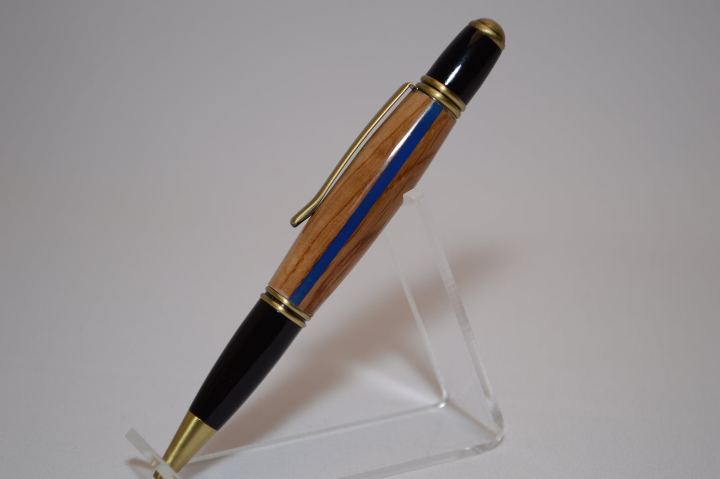 Thin Blue Line  Twist Pen  in Oak With a  Antique Brass and Black Finish