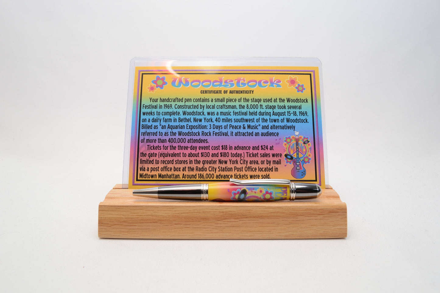 Handcrafted Pen Featuring a Small Piece of Woodstock Stage Wood and Cast in Acrylic.