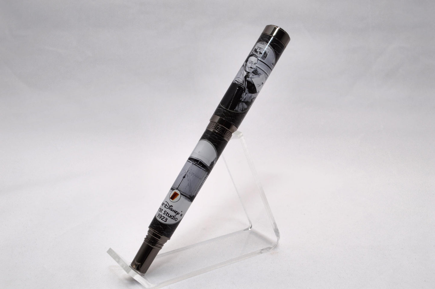 Handcrafted Rollerball Pen Featuring a Small Piece of Wood From Walt Disney's First Garage Studio in Hollywood, CA and Cast in Acrylic.