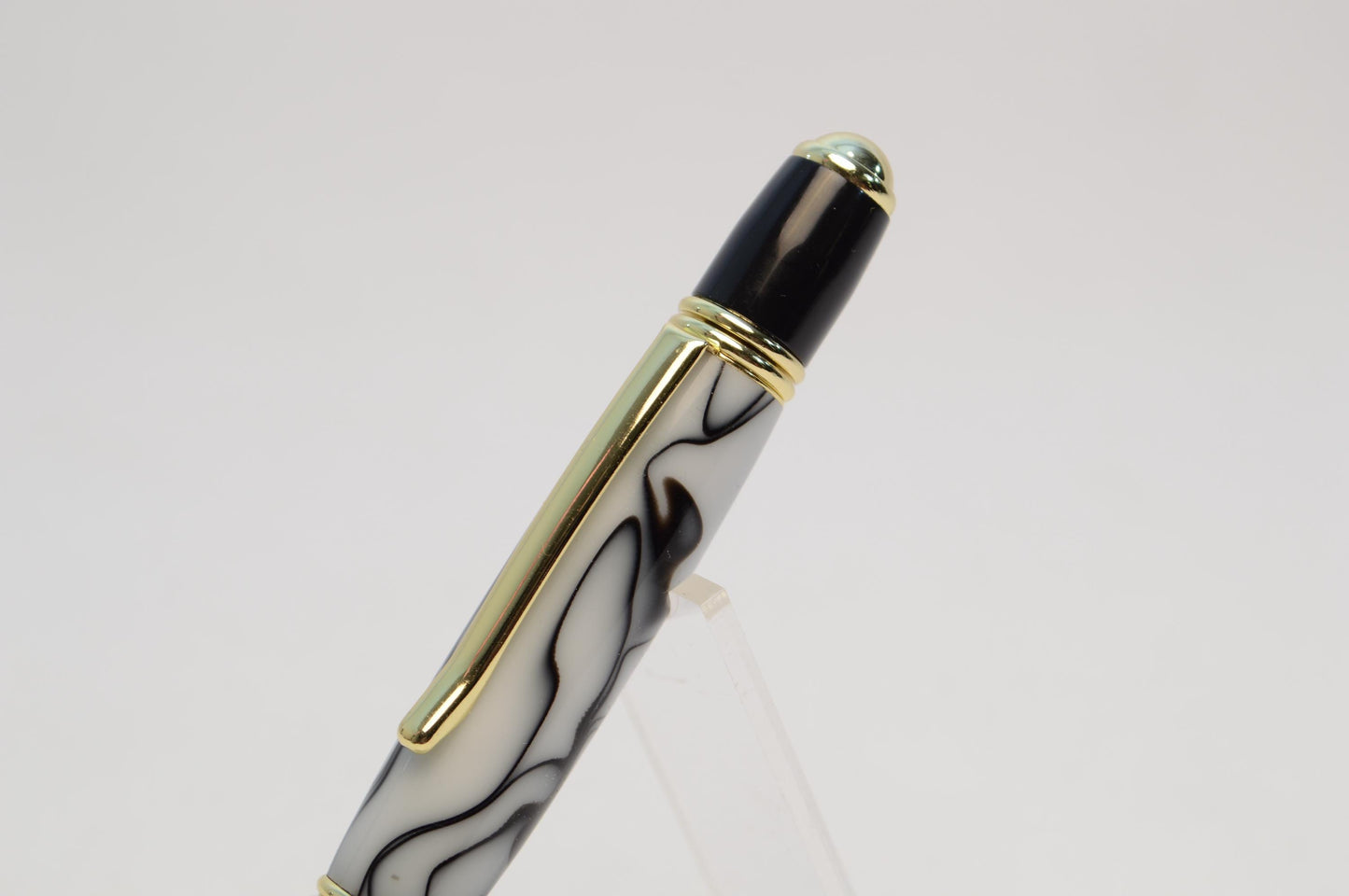 Elegant Handcrafted Twist Pen in Striking Black and White Acrylic with Gold and Black Chrome Finish