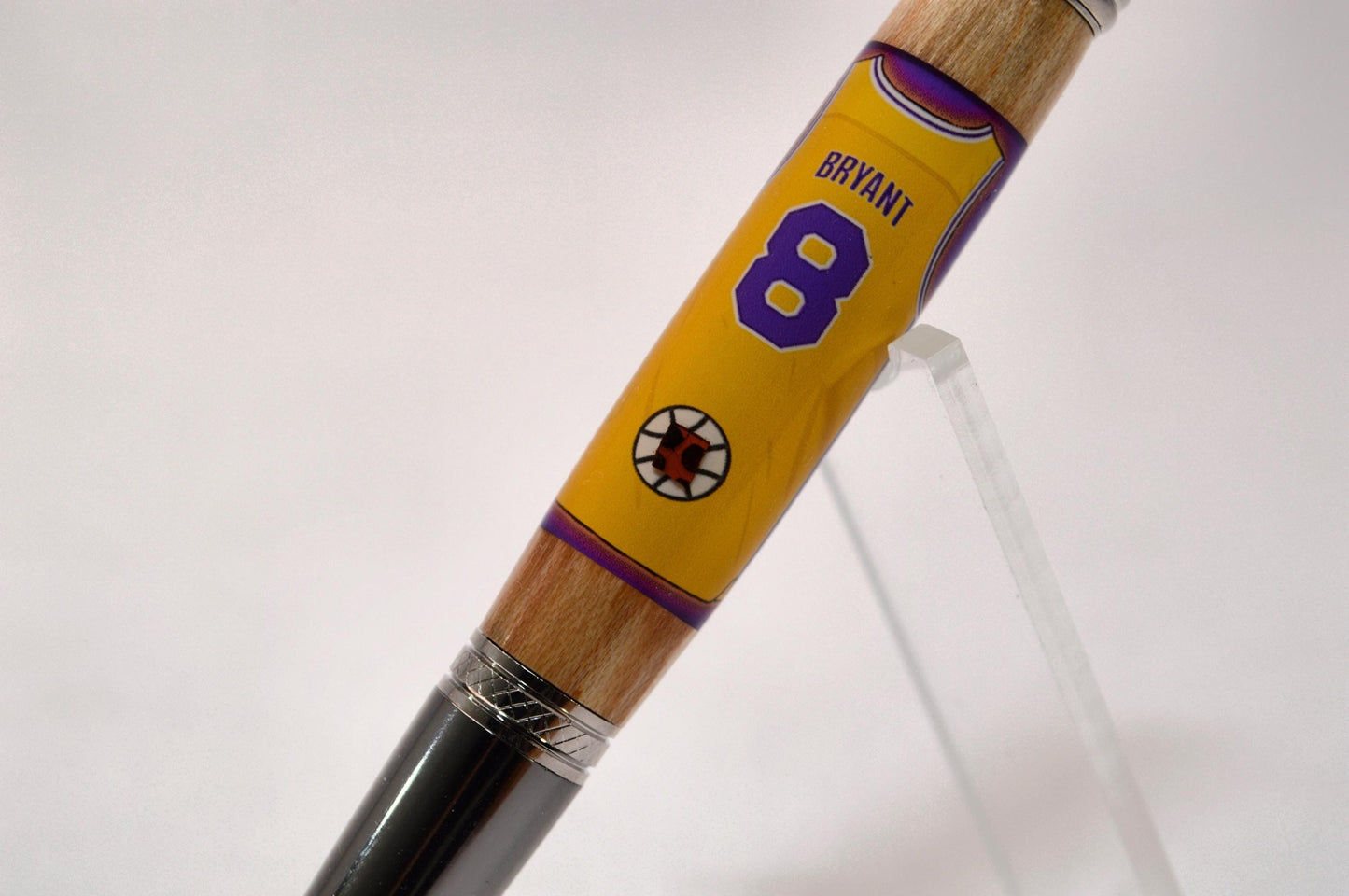 Handcrafted Pen Made With A Piece of A Game Used Basketball Used by Kobe Bryant and Wood From The LA Lakers' Forum Stadium Seat
