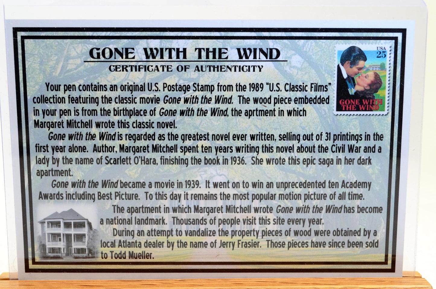 Handcrafted Pen Featuring Gone With The Wind Postage Stamp and Small Piece of Wood From Margaret Mitchell's apartment and cast in acrylic.
