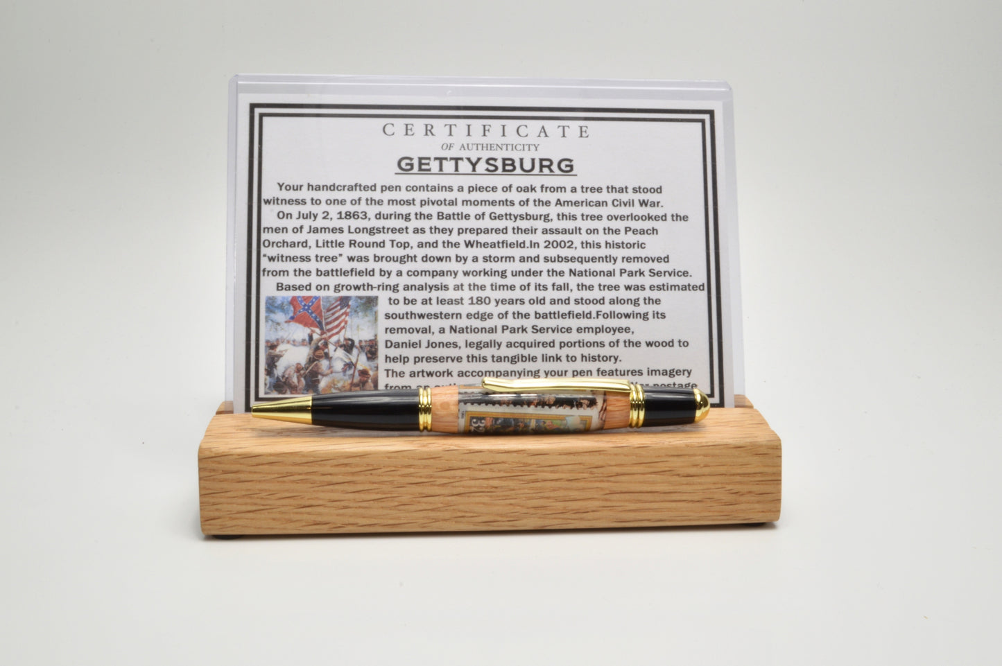Handcrafted Gettysburg Twist Pen Made With a US Stamp Depicting The Battle of Gettysburg and Witness Wood in Gold and Black Chrome Finish