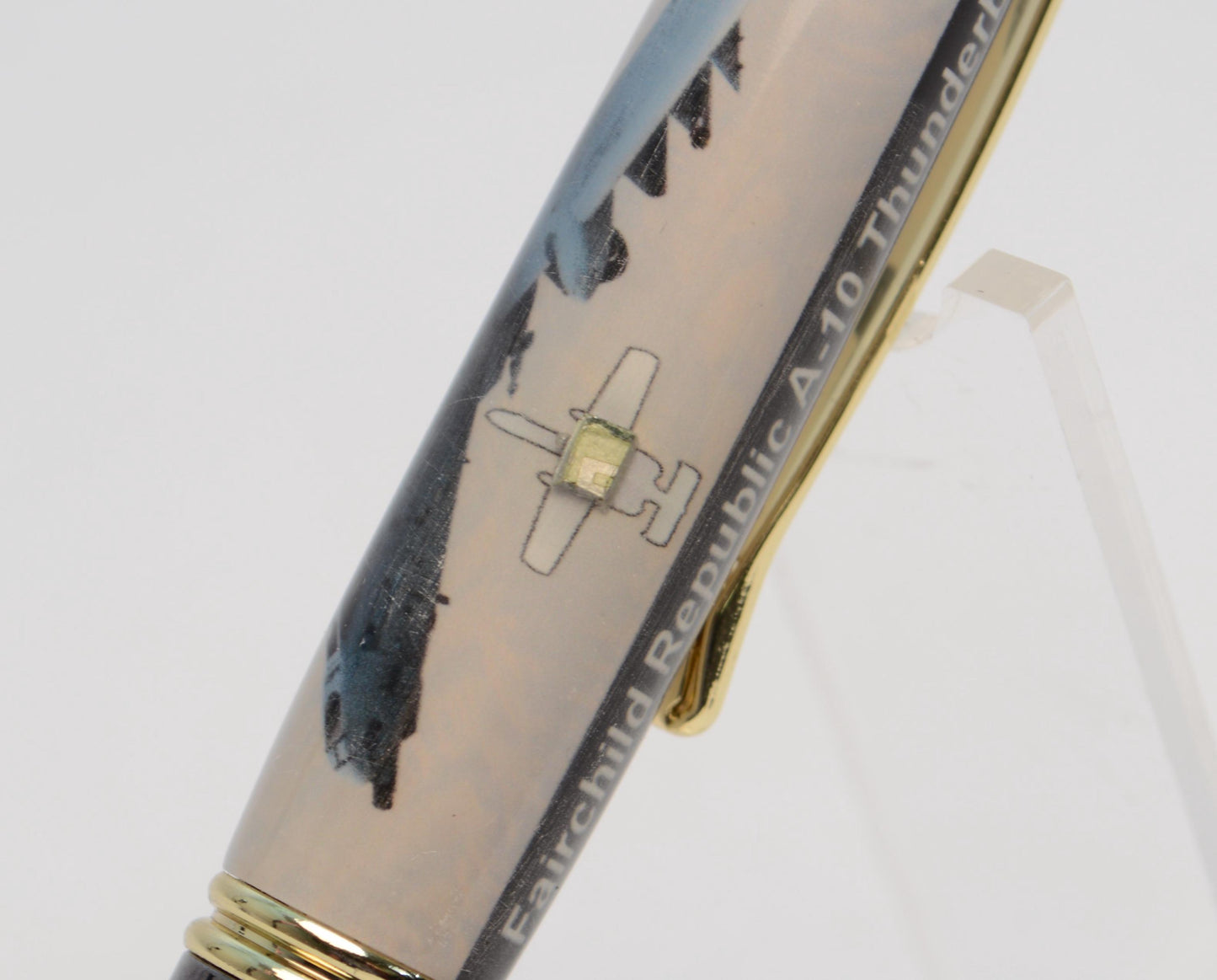 Handcrafted Twist Pen Made With a Small Piece of Aluminum From an A10 Warthog cast in acrylic.