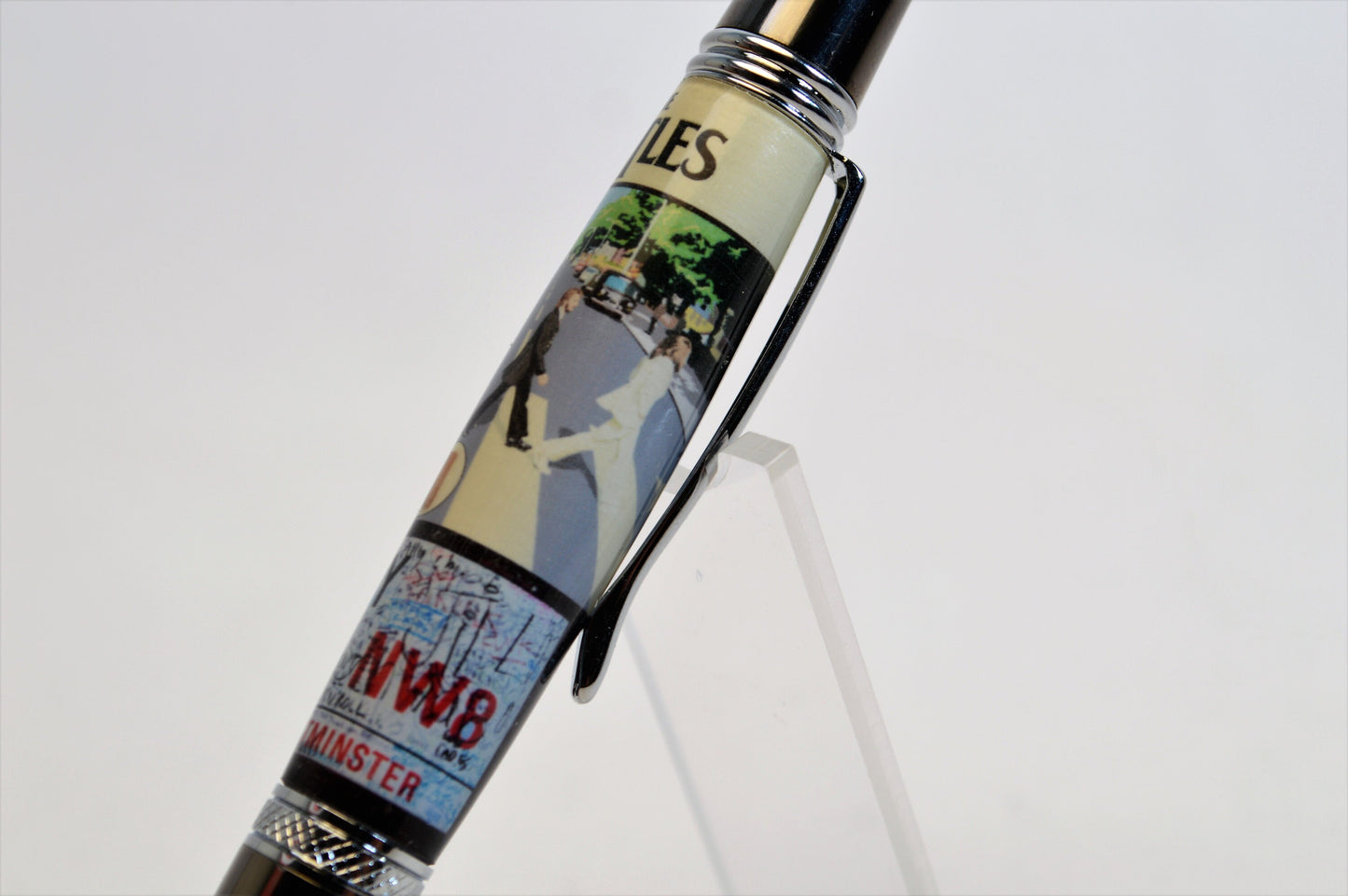 Handcrafted Pen Made with A Small Piece of Wood from Abbey Road Studios and cast in acrylic.