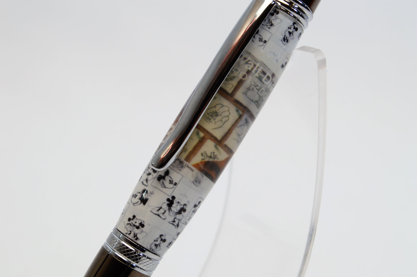 Handcrafted Pen Featuring a Walt Disney Stamp and Small Piece of Wood From Walt Disney's first garage studio in Hollywood, CA.