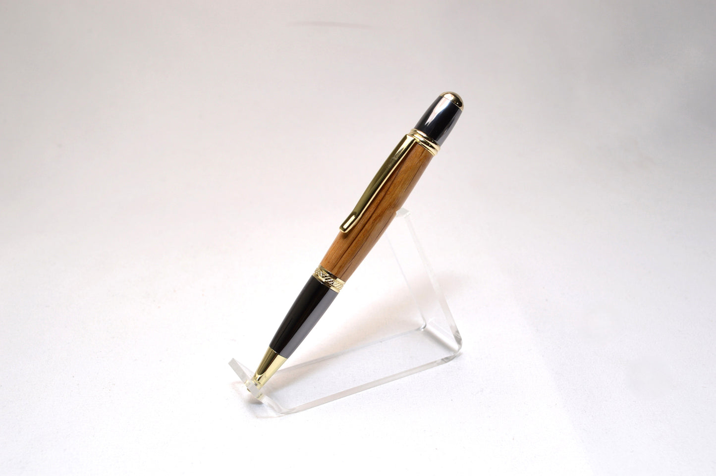 Whiskey Barrel Twist Pen in Gold and Black Titanium Finish with Velvet Pouch.