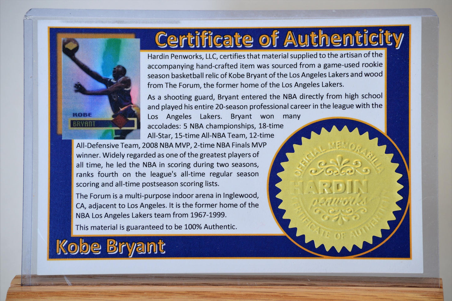 Handcrafted Pen Made With A Piece of A Game Used Basketball Used by Kobe Bryant and Wood From The LA Lakers' Forum Stadium Seat
