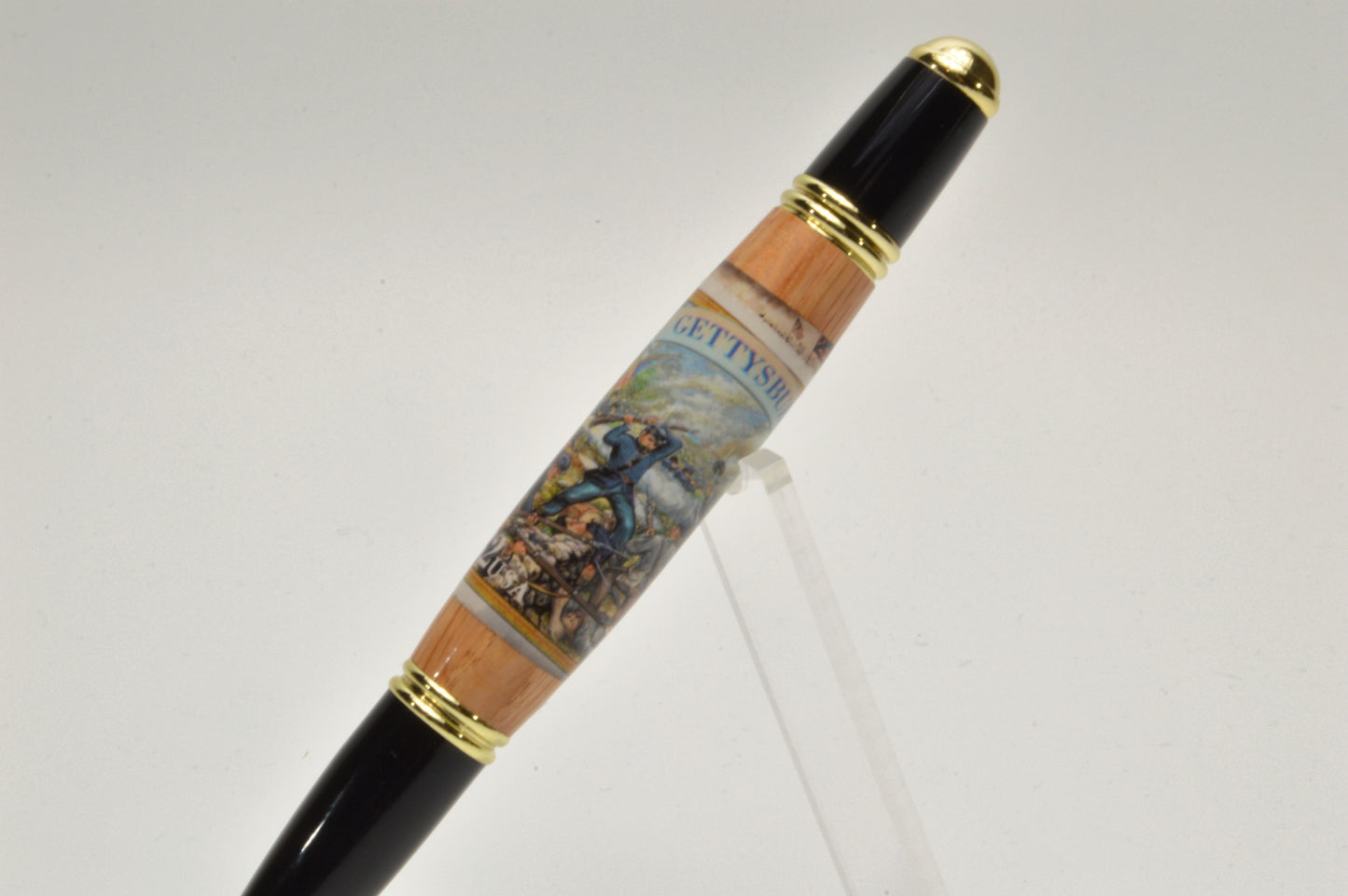 Handcrafted Gettysburg Twist Pen Made With a US Stamp Depicting The Battle of Gettysburg and Witness Wood in Gold and Black Chrome Finish
