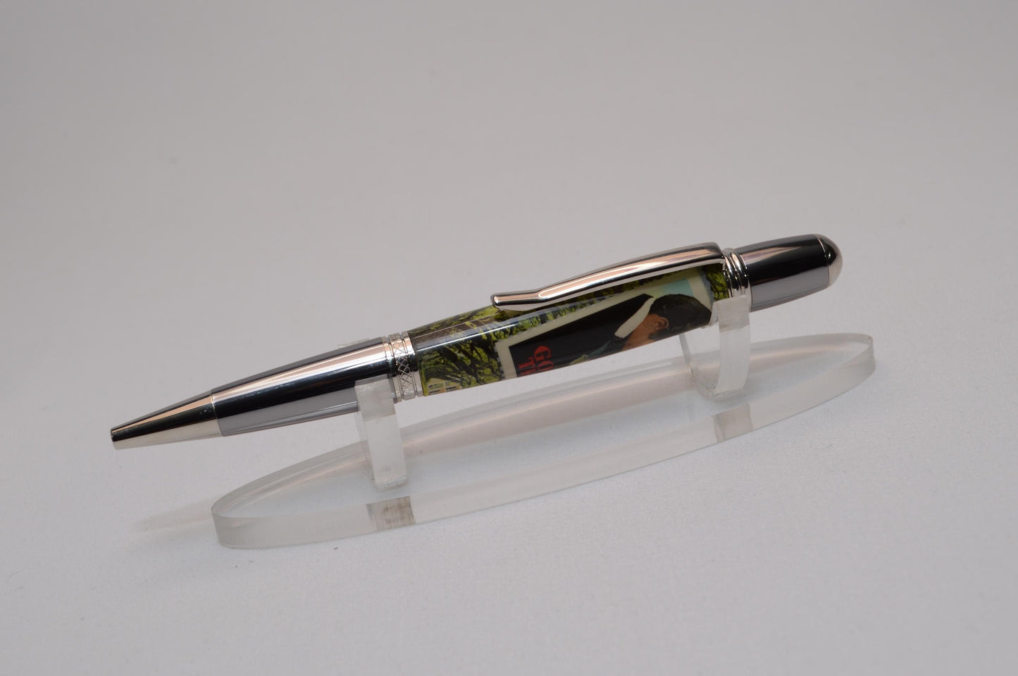 Handcrafted Pen Featuring Gone With The Wind Postage Stamp and Small Piece of Wood From Margaret Mitchell's apartment and cast in acrylic.