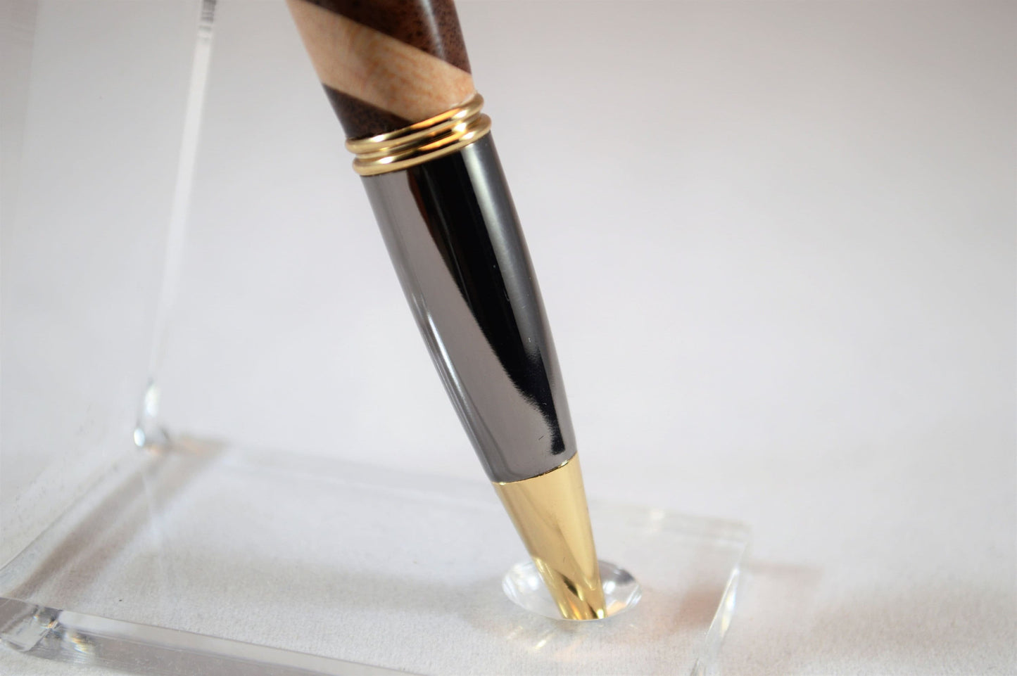One of a Kind Classic Twist Pen in 22k Gold and Gunmetal Finish with Handcrafted Maple and Walnut.