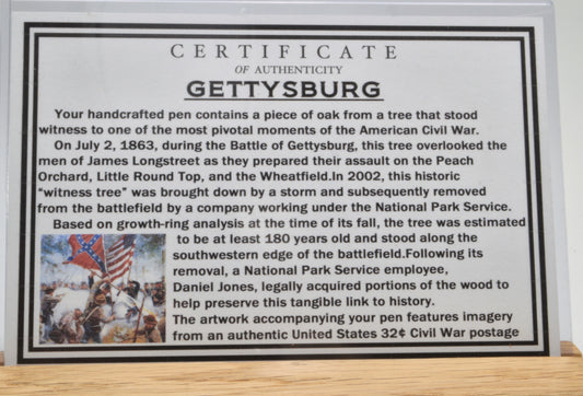 Handcrafted Gettysburg Twist Pen Made With a US Stamp Depicting The Battle of Gettysburg and Witness Wood in Gold and Black Chrome Finish