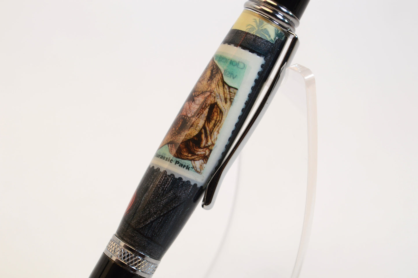 Handcrafted Pen Featuring A Jurassic Park US Postage Stamp & Movie Set Tree Wood Cast in Acrylic