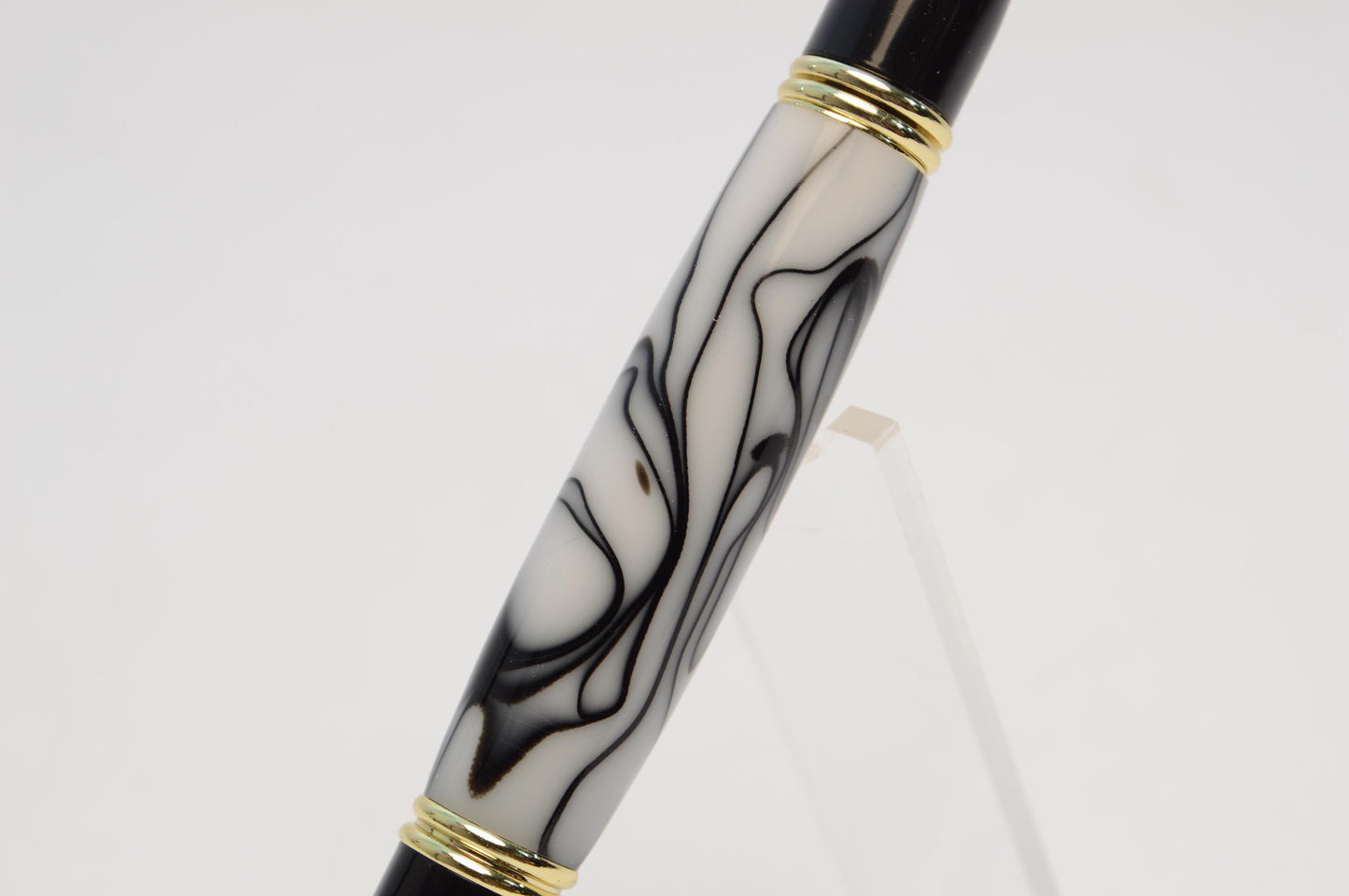 Elegant Handcrafted Twist Pen in Striking Black and White Acrylic with Gold and Black Chrome Finish