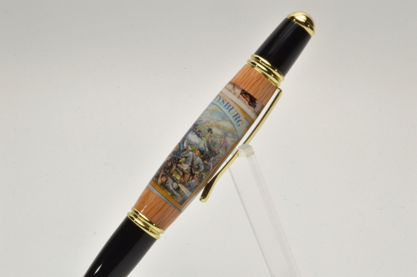 Handcrafted Gettysburg Twist Pen Made With a US Stamp Depicting The Battle of Gettysburg and Witness Wood in Gold and Black Chrome Finish
