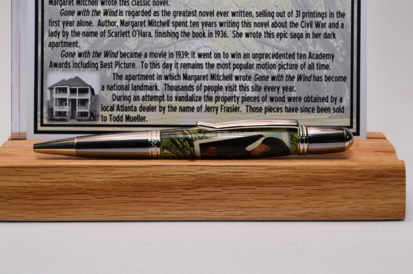 Handcrafted Pen Featuring Gone With The Wind Postage Stamp and Small Piece of Wood From Margaret Mitchell's apartment and cast in acrylic.