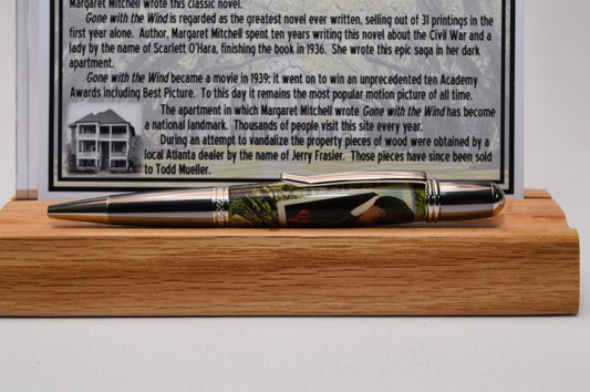 Handcrafted Pen Featuring Gone With The Wind Postage Stamp and Small Piece of Wood From Margaret Mitchell's apartment and cast in acrylic.
